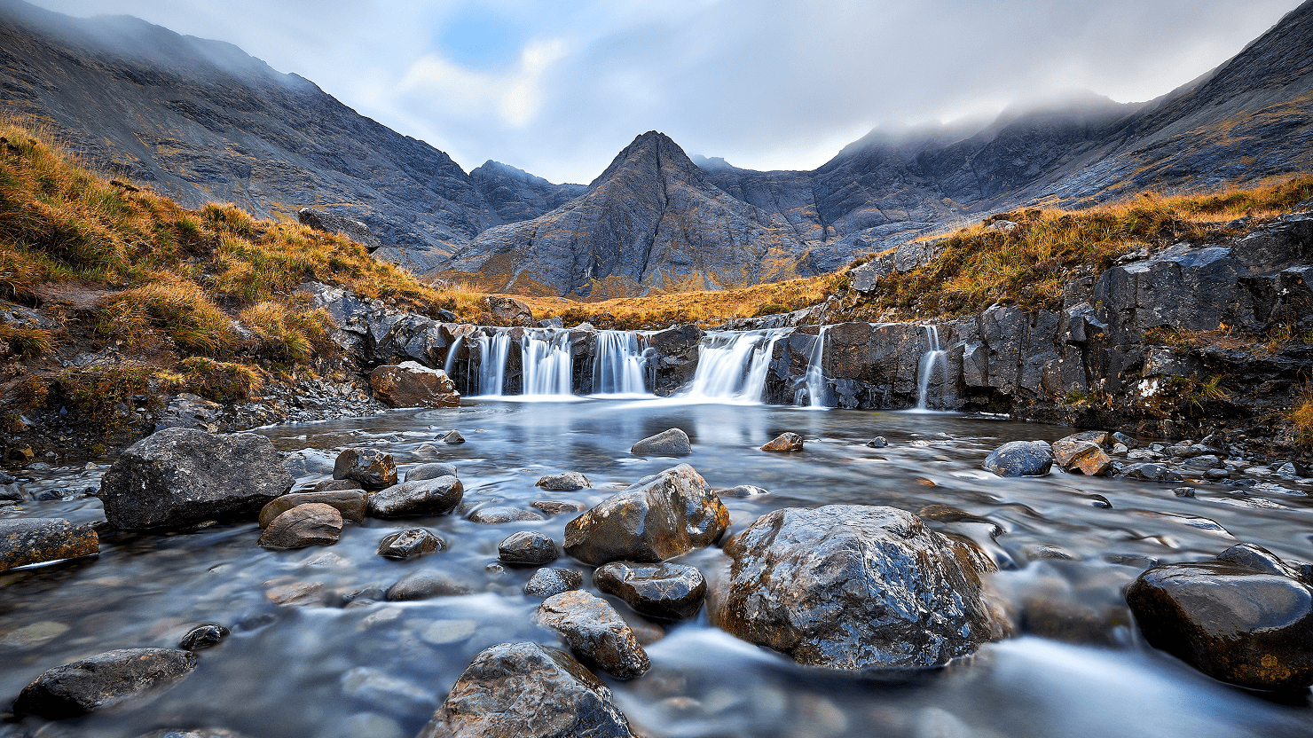 Scenic waterfall in rugged terrain